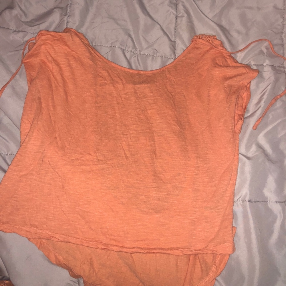 Orange top with details in the back